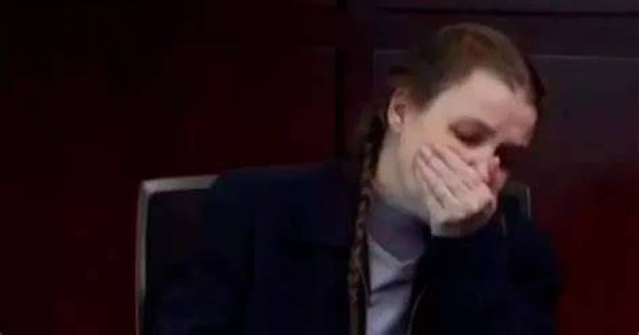Killer mom vomits in court when she sees photos of emaciated son who