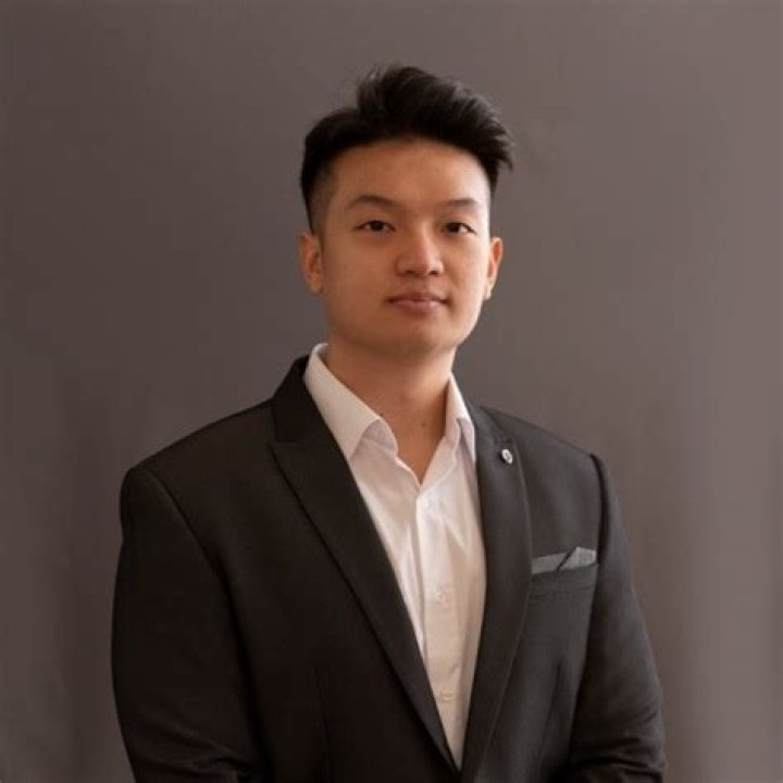 Wayne Liang: Meet the 26-year-old self-made millionaire 2 Wayne Liang posing by his car